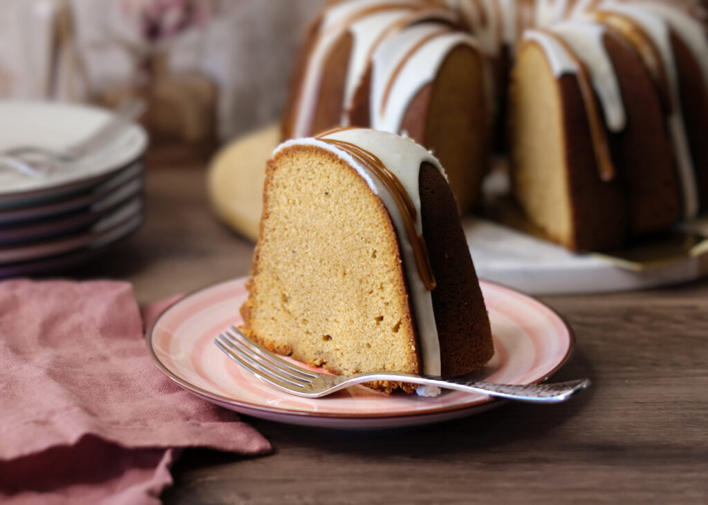 Dulce de Leche Vanilla Bean Pound Cake slice served on a small plate.