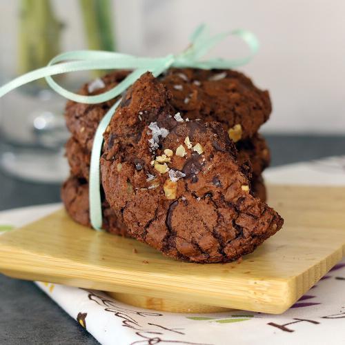 Mudslide Cookies on a wooden plate with a green bow