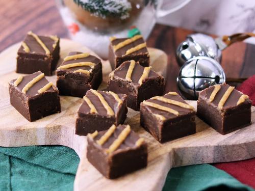 Chocolate Peanut Butter Old Fashioned Fudge on a gingerbread man platter