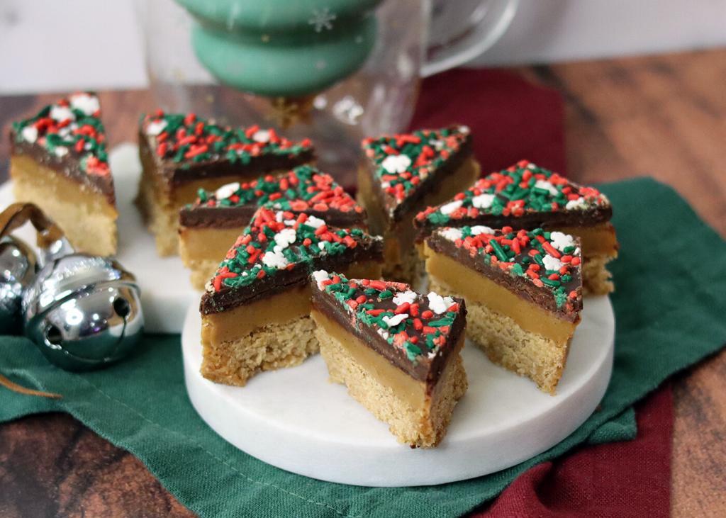 Dark Chocolate Sea Salt version of the Graham Cracker Millionaire Bars on a snowman platter