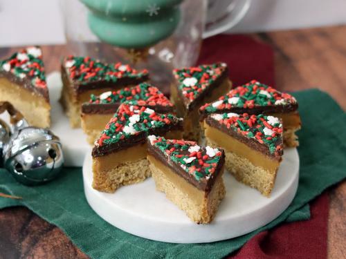Dark Chocolate Sea Salt version of the Graham Cracker Millionaire Bars on a snowman platter