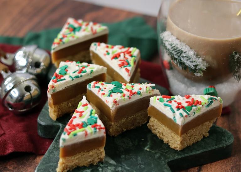 White Chocolate Latte version of the Graham Cracker Millionaire Bars on a Christmas tree platter