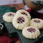 White Chocolate Cranberry Thumbprints on a Christmas tree serving board