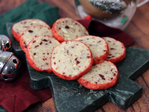 White Chocolate Cranberry Pecan Tea Cookies on a Christmas tree platter