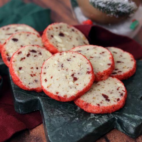 White Chocolate Cranberry Pecan Tea Cookies on a Christmas tree platter