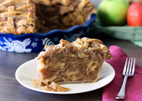 Caramel Toffee Apple Pie slice on a white plate