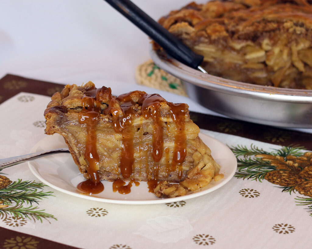 Caramel Toffee Apple Pie slice with caramel