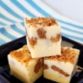 A stack of 3 pieces of New York Cheesecake Fudge