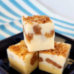 A stack of 3 pieces of New York Cheesecake Fudge