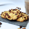 Chocolate Chip Cookies for Two on a slate board with chocolate milk