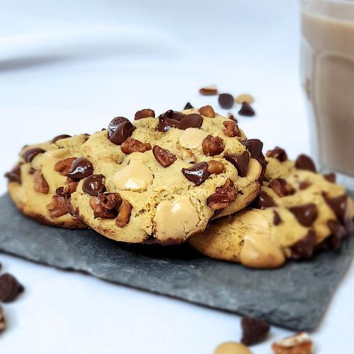 Chocolate Chip Cookies for Two on a slate board with chocolate milk