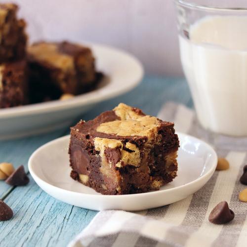 Brookie on a white plate with a glass of milk
