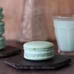 Mandalorian Macarons on hexagon plates with a glass of blue milk