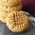 Peanut Butter Cookies stacked up on a slate serving board