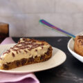 A slice of a Chocolate Chip Cookie Tart on a plate.