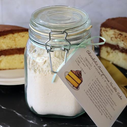 DIY Vanilla Cake Mix in front of a baked cake.