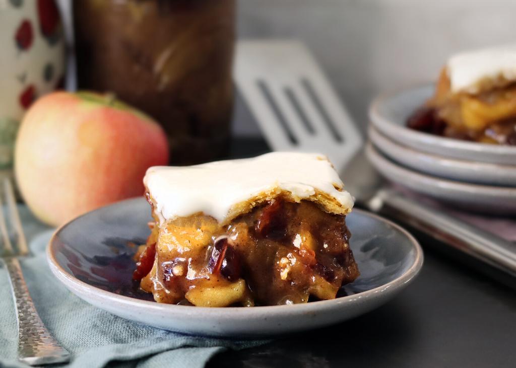 Apple Square slice on a small plate with vanilla glaze