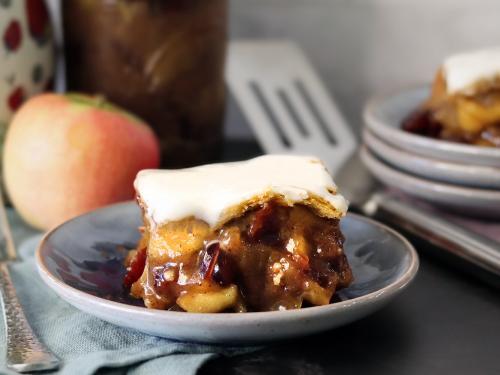Apple Square slice on a small plate with vanilla glaze