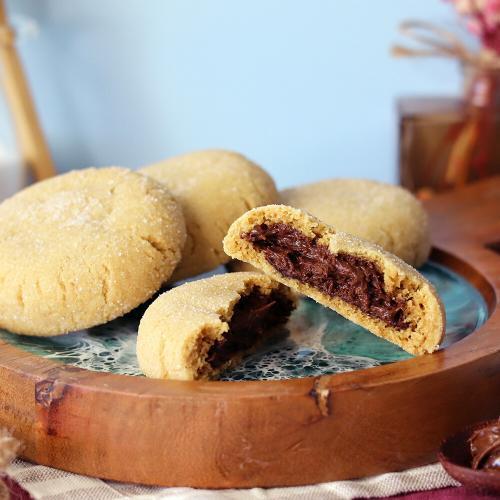 Inside Out Magic in the Middle Cookies on a tray with one broken open