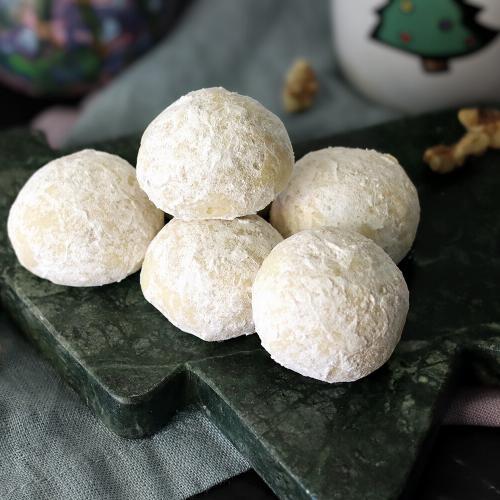 Butter balls piled on a small tree shaped serving platter