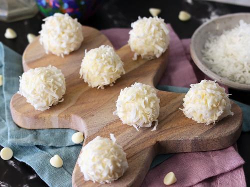 White Chocolate Coconut Snowballs on a gingerbread man serving platter