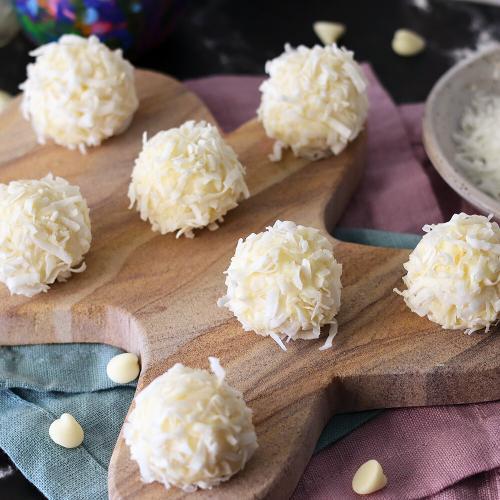 White Chocolate Coconut Snowballs on a gingerbread man serving platter