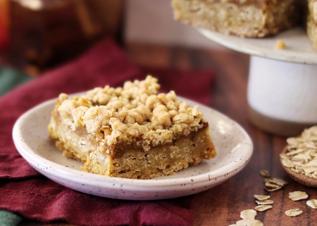 Oatmeal Crumble Pumpkin Pie Bar on a small plate.