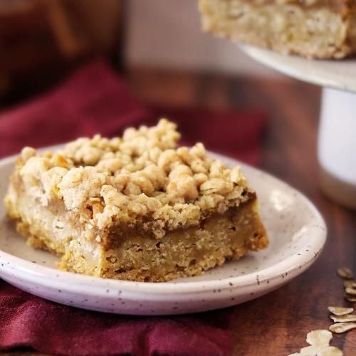 Oatmeal Crumble Pumpkin Pie Bar on a small plate.