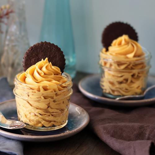 Peanut Butter Mousse served in mini mason jars with chocolate wafer cookie garnish.