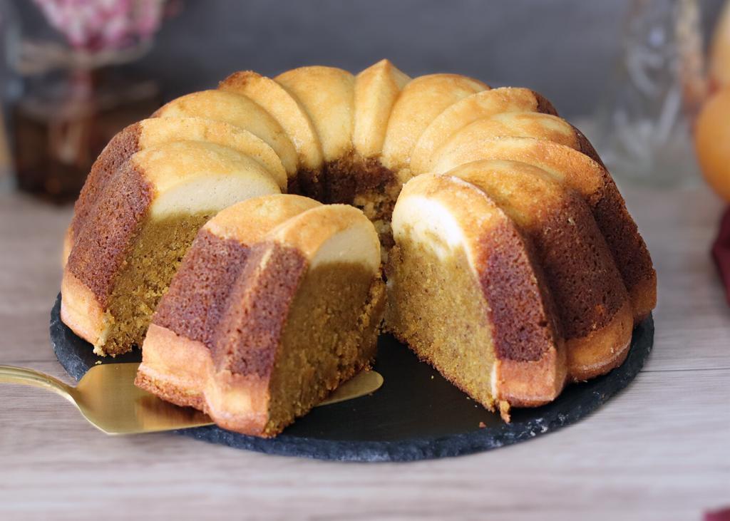 Pumpkin Ricotta Breakfast Bundt being sliced and served.
