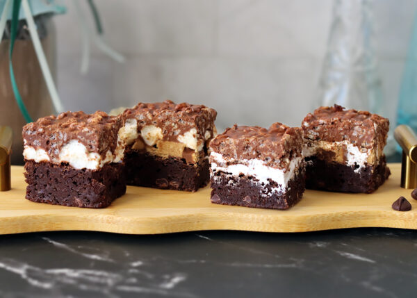 Four Chocolate Crunch Brownies comparing mini marshmallow vs marshmallow creme preparation both with and without extra candy.