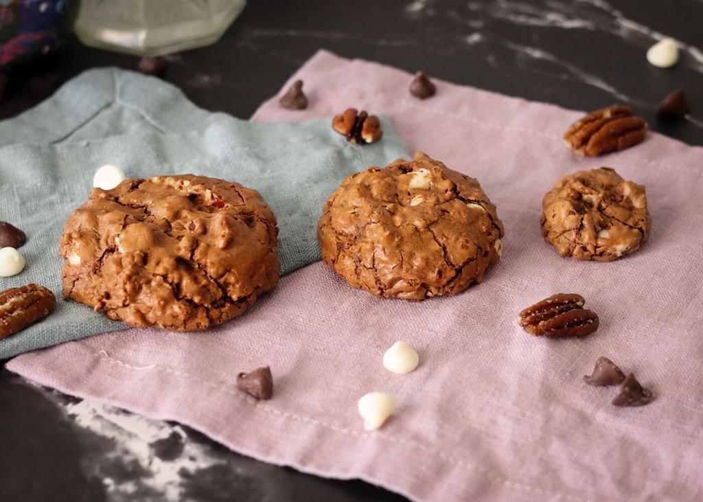 3 varying sizes of Chocolate Bliss Cookies from large to bite sized.