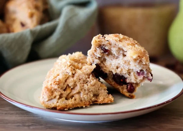 Cranberry Pear Scone broken open to show the fluffy interior texture.