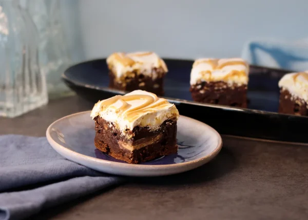 A Fluffernutter Brownie on a small plate displaying distinct layers