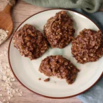 No Bake Cookies on a plate with bites taken.