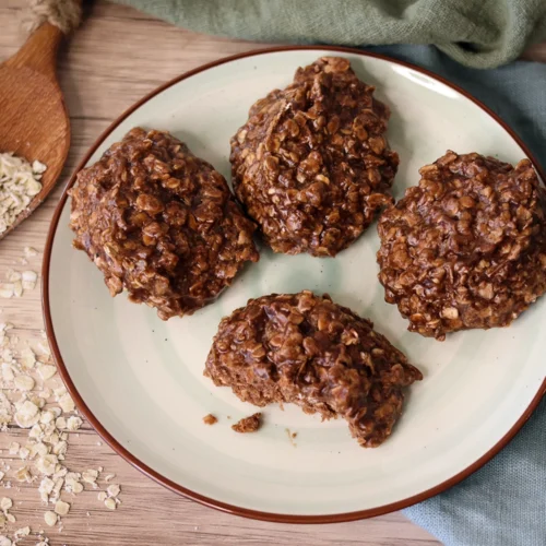 No Bake Cookies on a plate with bites taken.